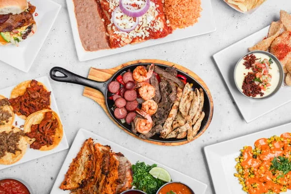 Fajitas, enchiladas, and tacos from El Patron’s promotional menu photograph